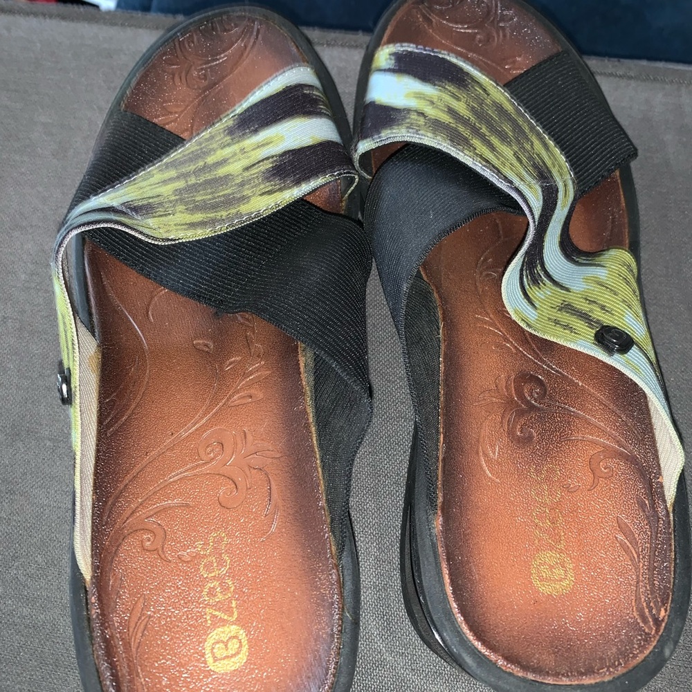They are a wedge sandal . They are made by Bree’s.